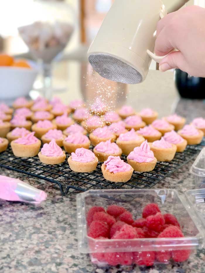 Mini Berry Cookie Cups with sprinkling powdered sugar