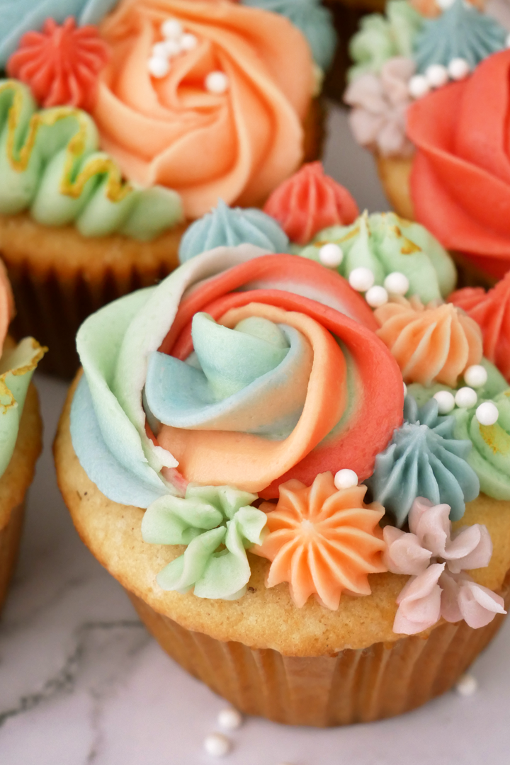 PeachFilled Spring Cupcakes with Brandy Buttercream Flowers