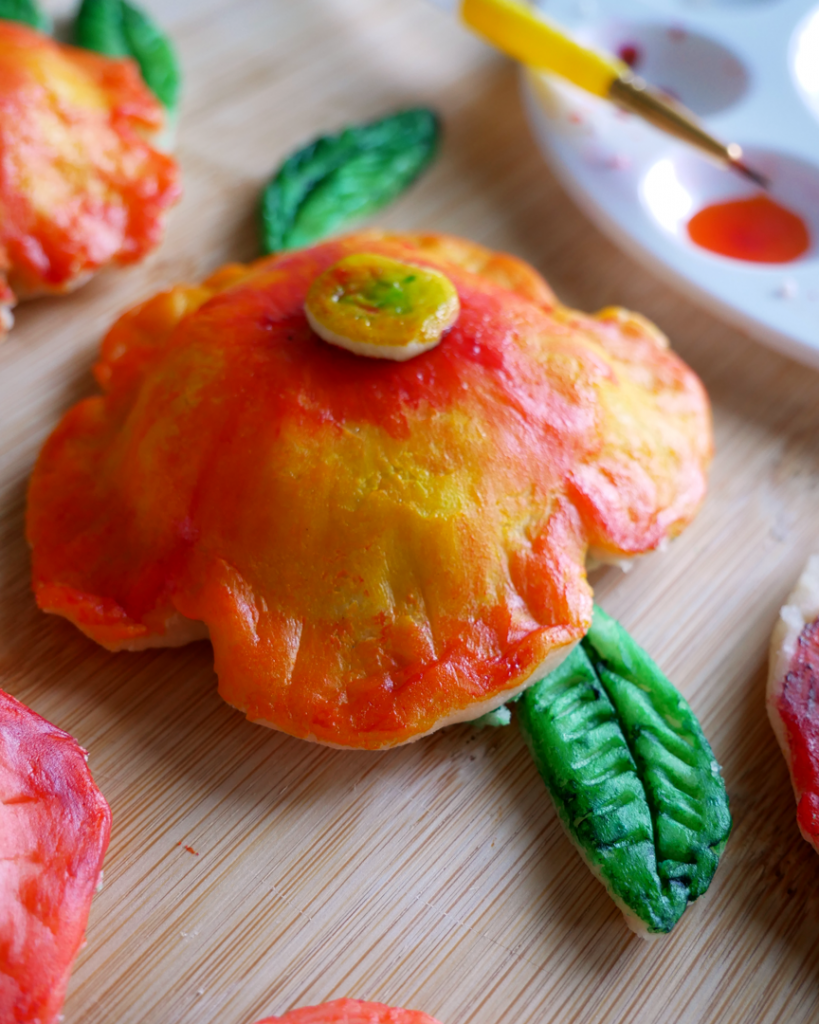 Watercolor-Painted Apple Hand Pies painted with Edible Watercolor to resemble flowers