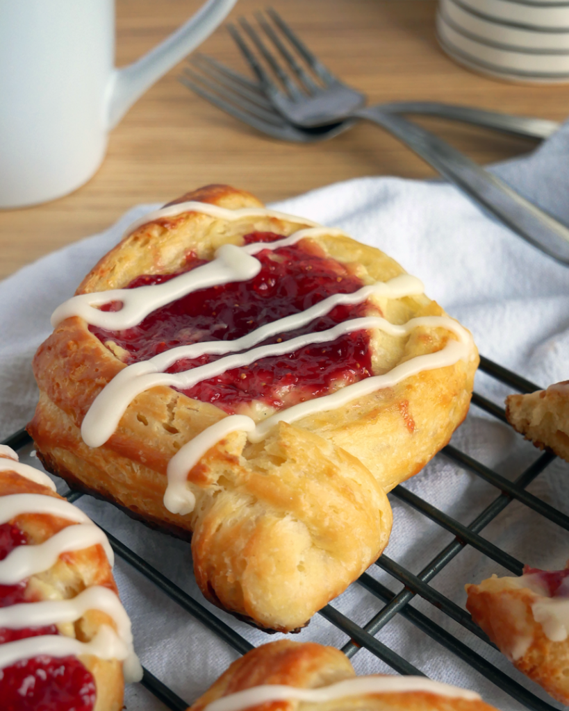 Fig and goat cheese filled danish pastry with vanilla glaze.