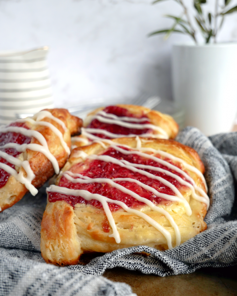 Fig and goat cheese filled danish pastry with vanilla glaze.