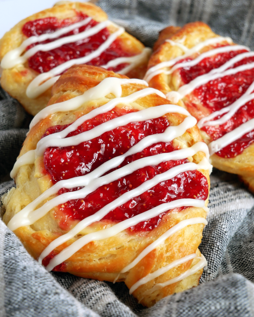 Fig and goat cheese filled danish pastry with vanilla glaze.