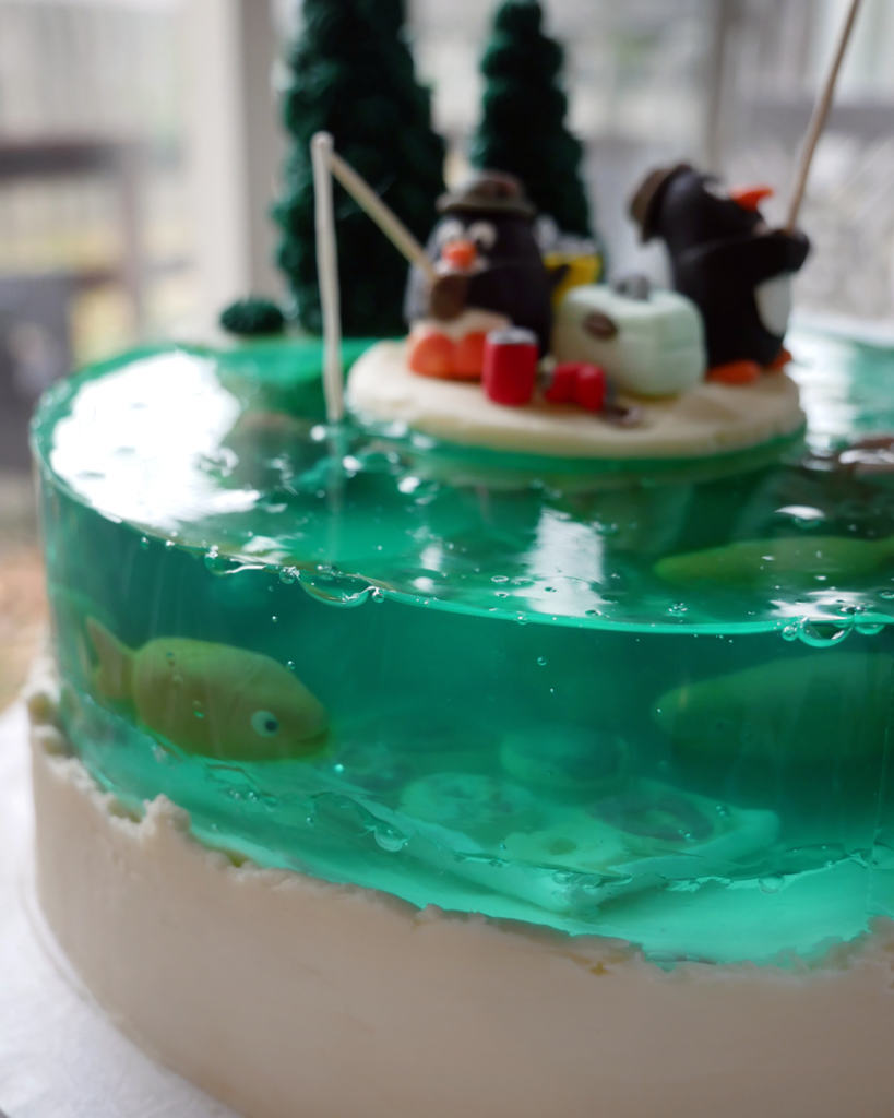 Gelatin under the sea cake made with jello and cake layers to look like the ocean.